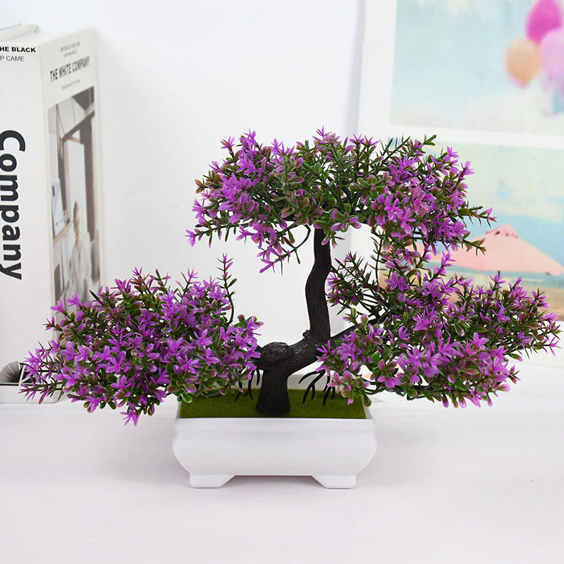 A purple colored artificial Bonsai tree.