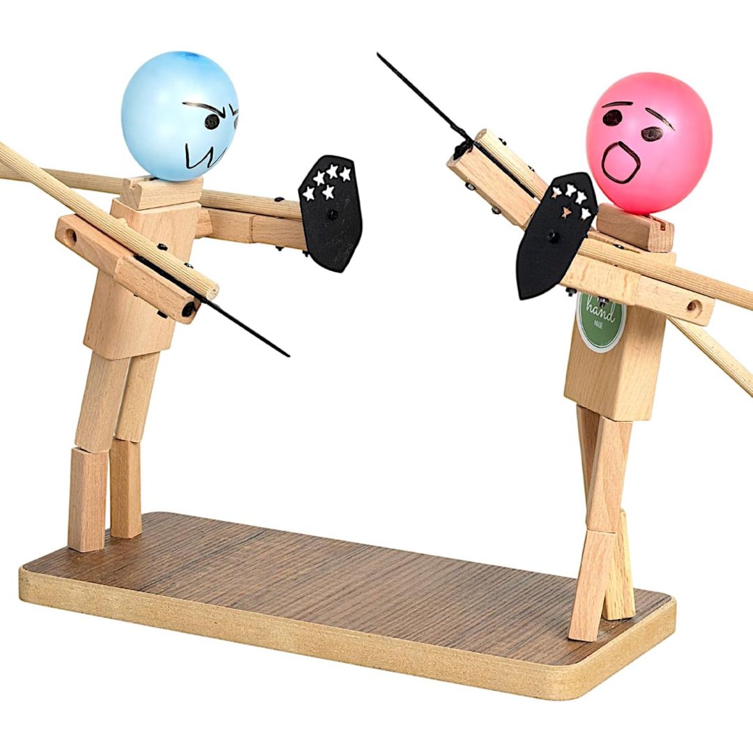 Wooden balloon fencing puppets board game with two sword-fighting figures, shields and colorful balloon heads
