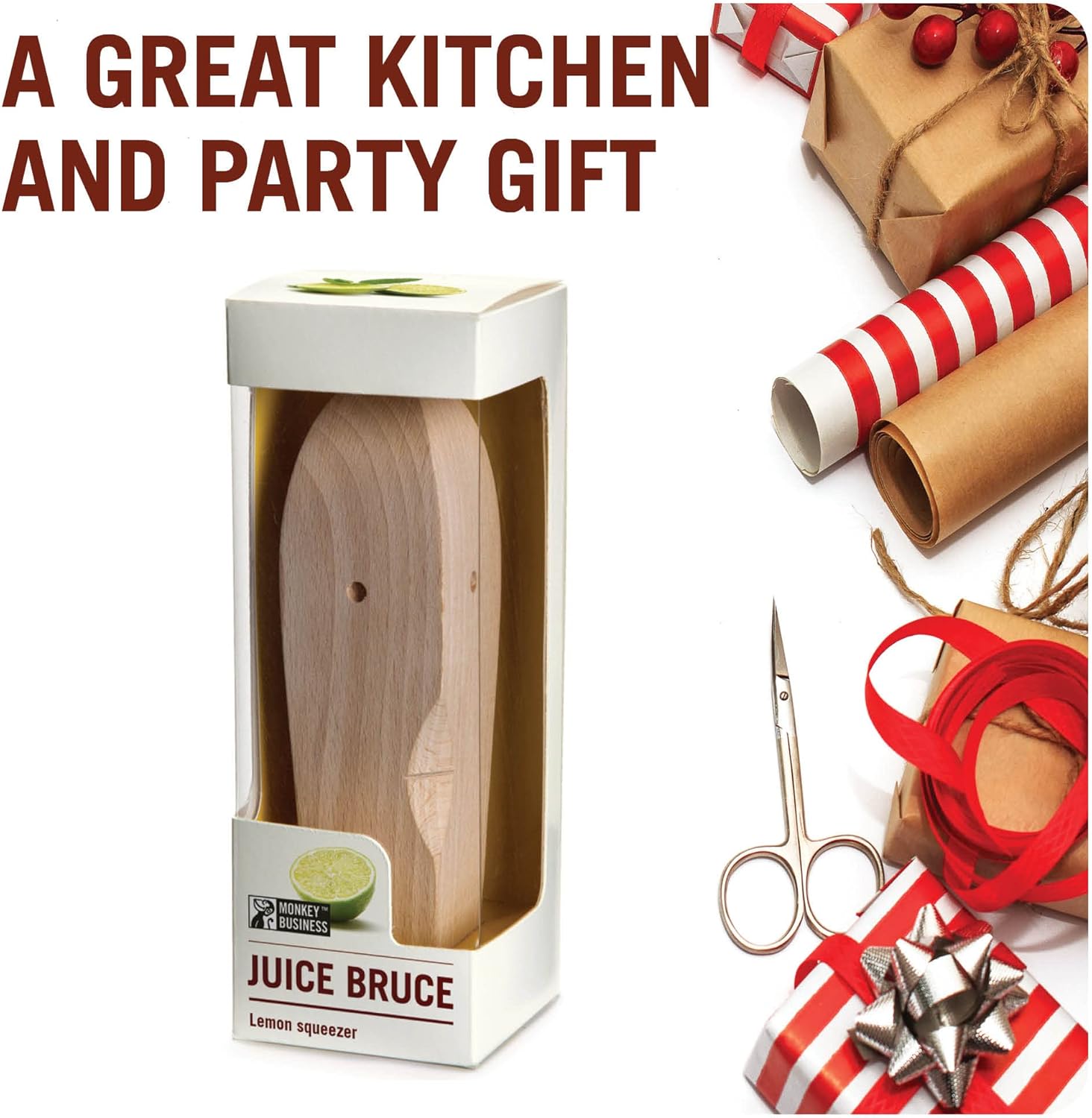 Wooden citrus reamer packaged in a gift box labeled “Juice Bruce,” shown next to festive wrapping supplies and wrapped presents.