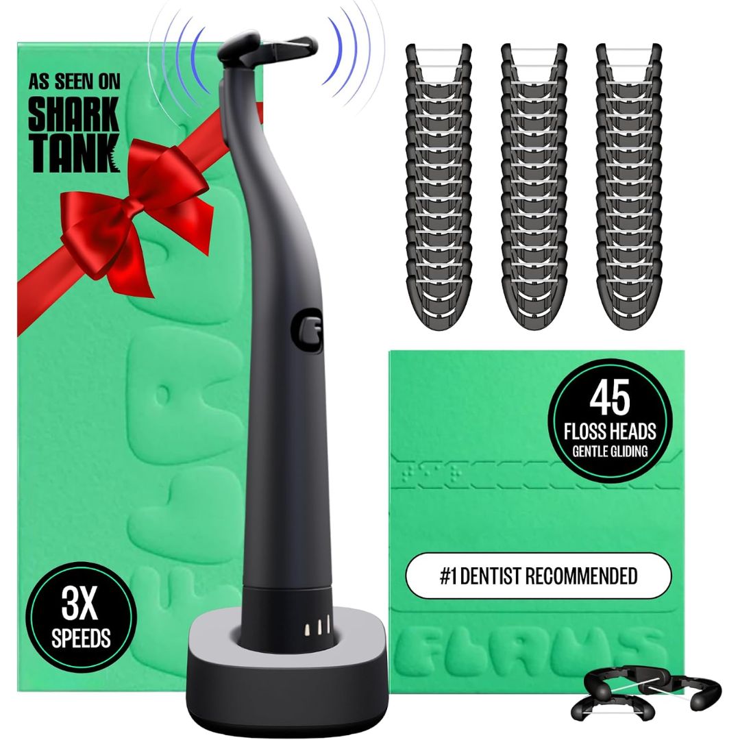 Black dental flosser with packaging and additional floss heads on a white background