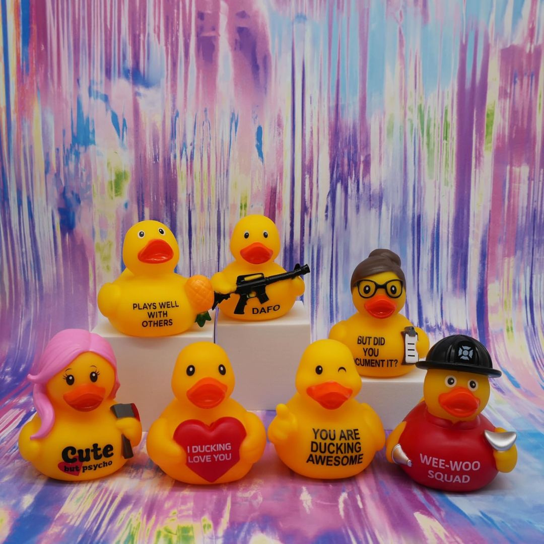 A group of funny rubber ducks with hilarious text printed on them