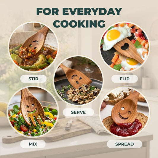 Wooden spoons with smiling faces used for cooking tasks on a kitchen counter.