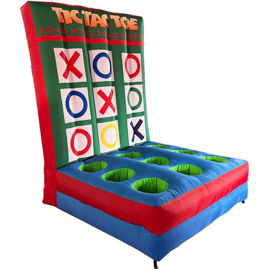 Inflatable outdoor Tictac Toe game set with a large green board featuring red, blue, and yellow play areas, a blue and red base with green circular cutouts, and a red backboard.