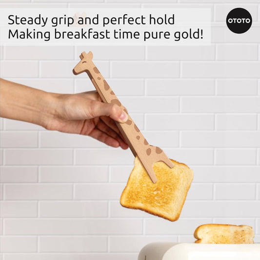 Hand using giraffe-shaped tongs to hold toast with text 'Steady grip and perfect hold. Making breakfast time pure gold!' and 'OTOTO' logo.