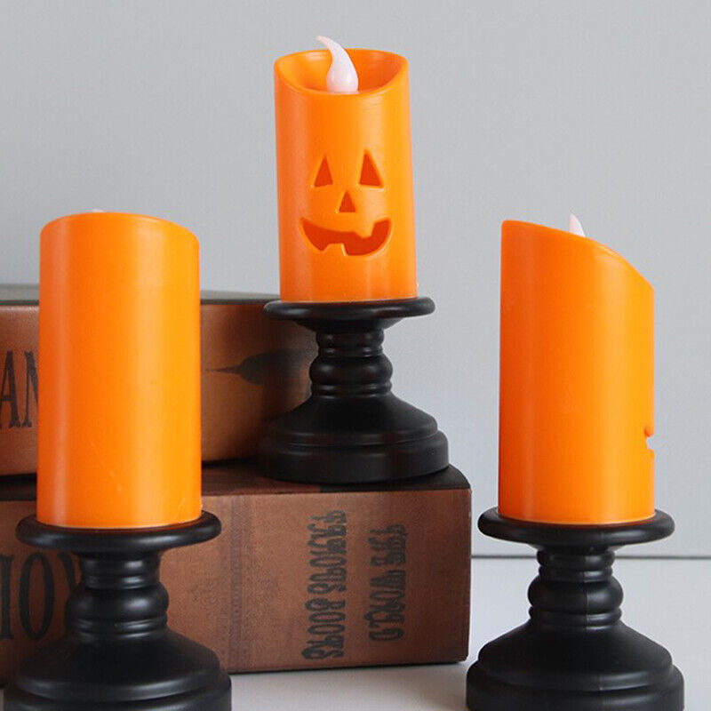 Create a spine-chilling ambiance with these spooktacular ghost-face candles.