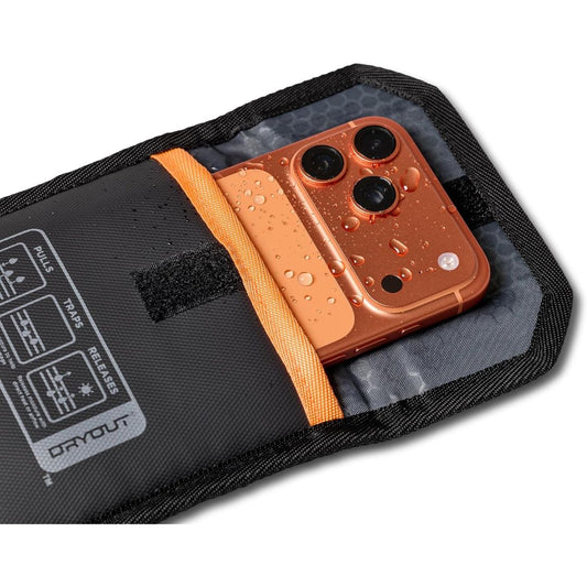 UAG x DRYOUT Recovery Phone Pouch holding a wet smartphone to actively remove moisture from the device