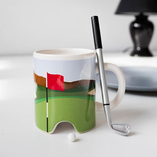 Golf-themed mug with a golf club and ball on a white surface