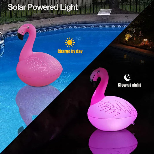 A solar-powered flamingo light charging by day and glowing at night over a pool.