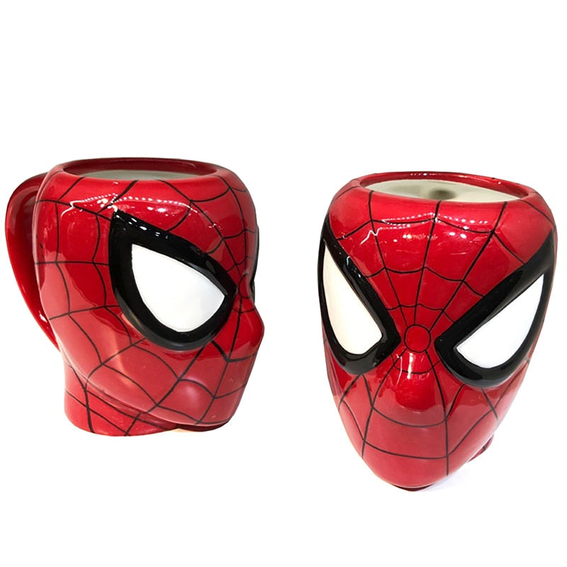 Two Spiderman coffee cups placed at different angles