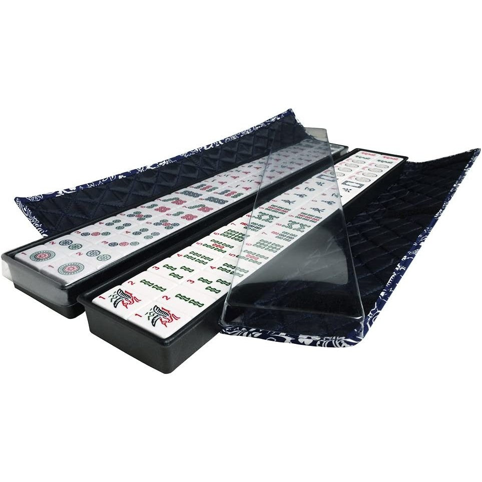 Two trays containing a selection of MahJong tiles.