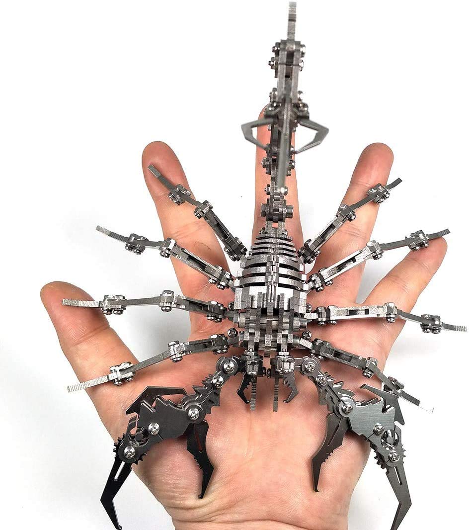 A fully complete scorpion built from a kit in the palm of a hand