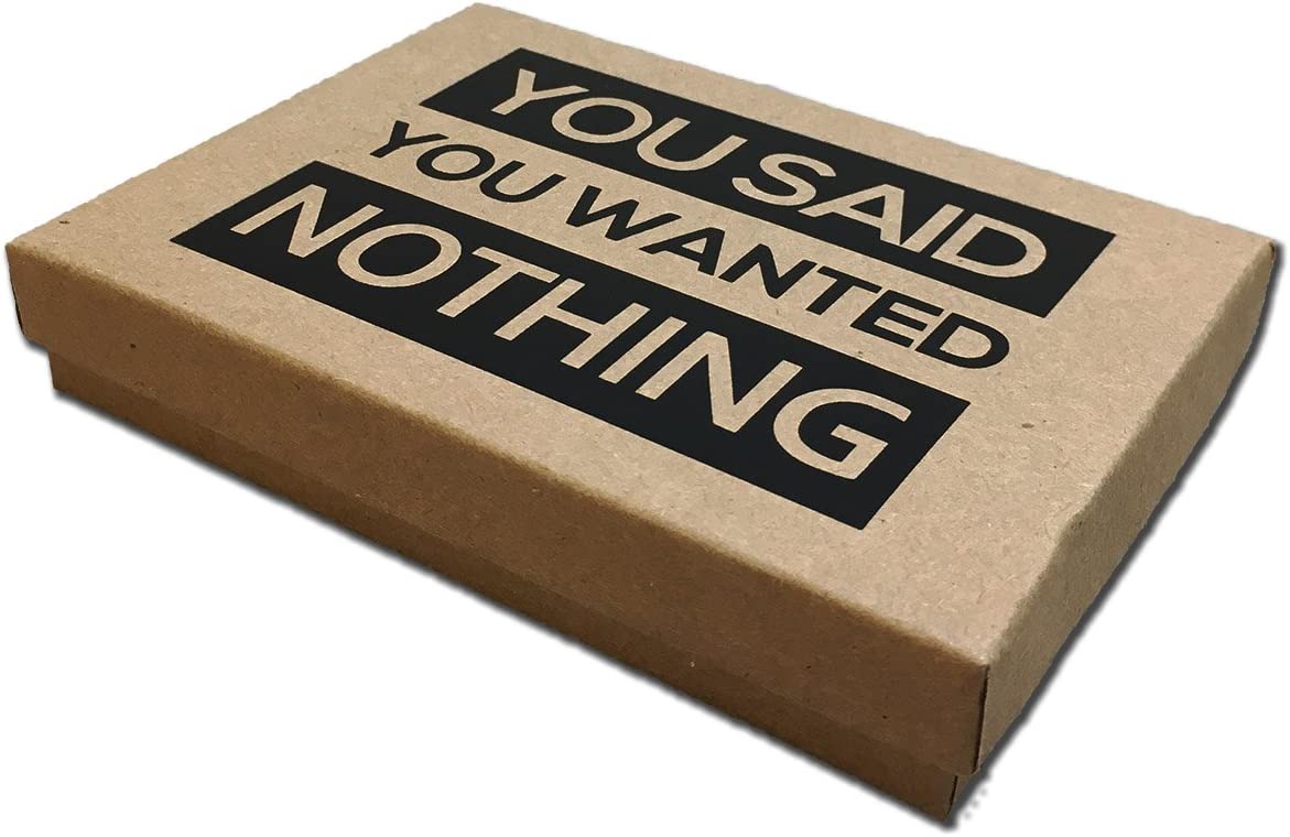 A brown box with a lid. There is text on the lid which says, 'You said you wanted nothing.'
