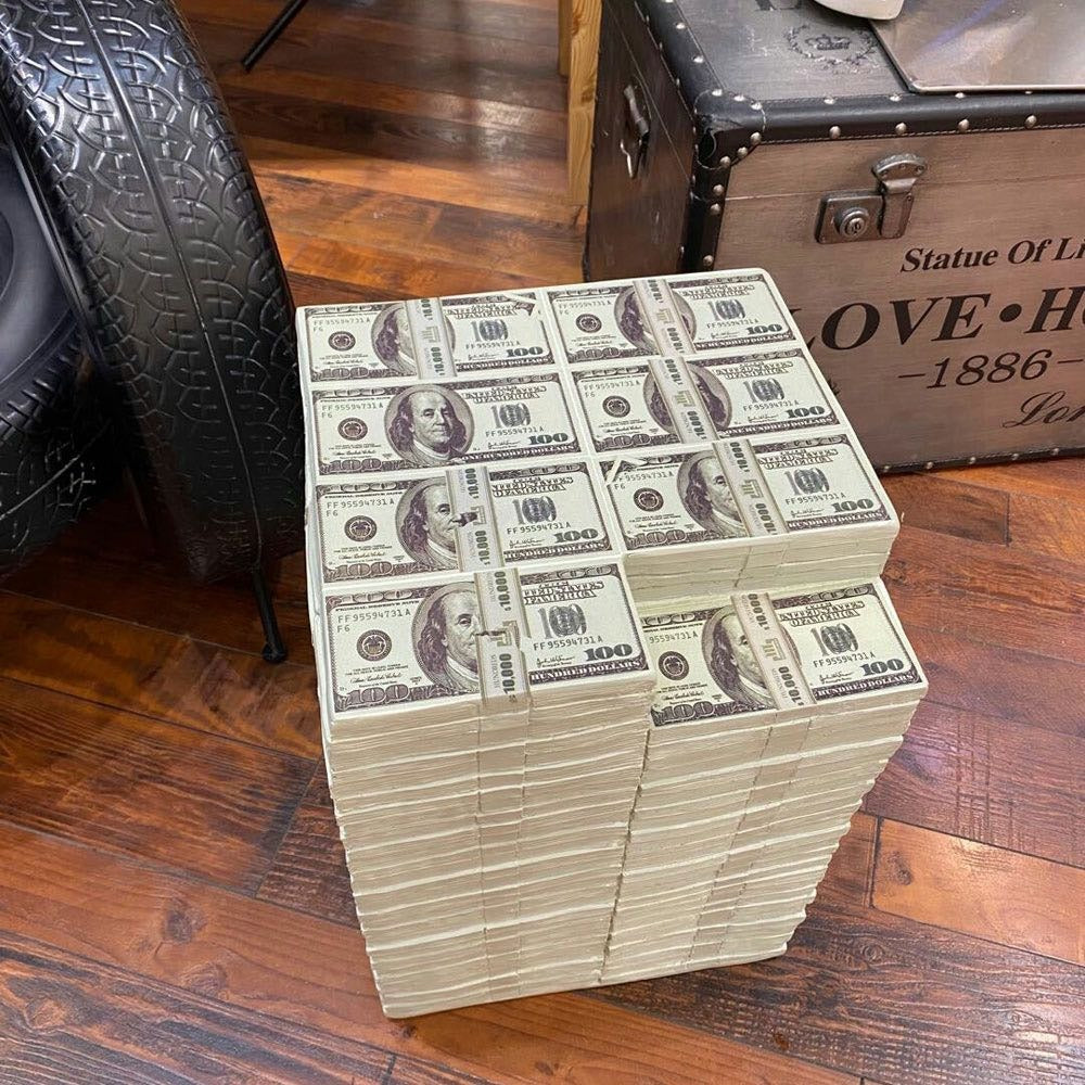 A stool made up of faux 100 dollar bill bank bundles.