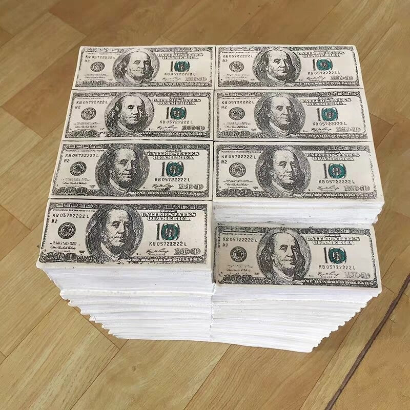 A resin stool made of fake 100 dollar American bills.
