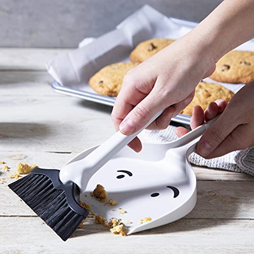 Dustache being used to clean up a mess