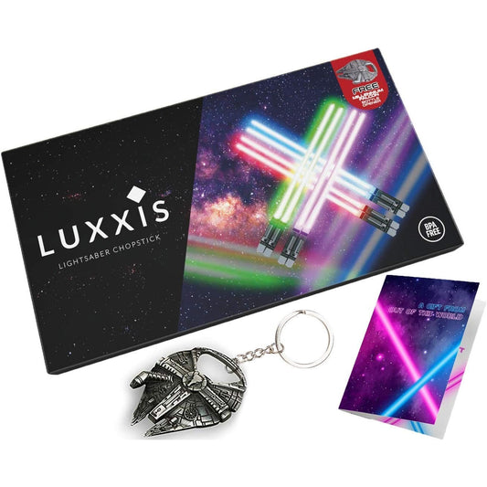 A boxed set of Star Wars LED lightsaber chopsticks with an instruction manual and a Millennium Falcon bottle opener.