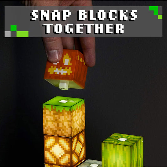 A hand is adding a block to the top of a Minecraft block building light. The text reads, 'Snap blocks together.'