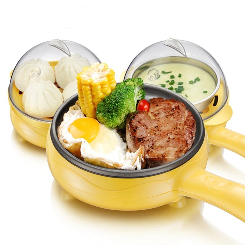 A multifunction egg cooker showing three types of food that can be cooked in it, including soup, Chinese dumplings and steak with corn and broccoli.