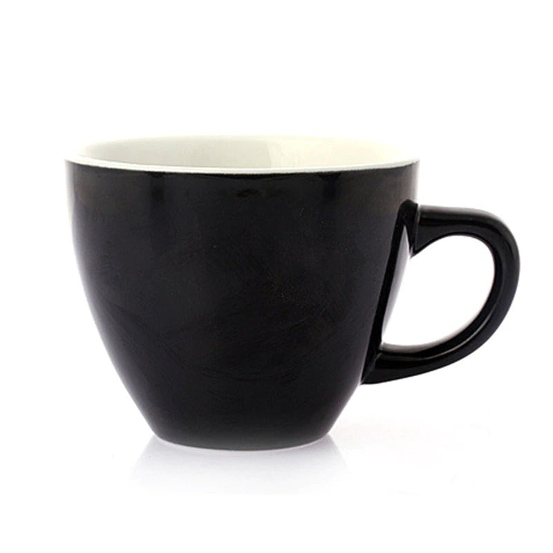 A black coffee cup with a white interior.