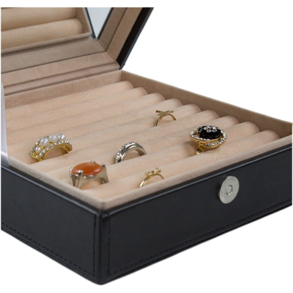 A close-up view of a ring box organizer with rings inside.