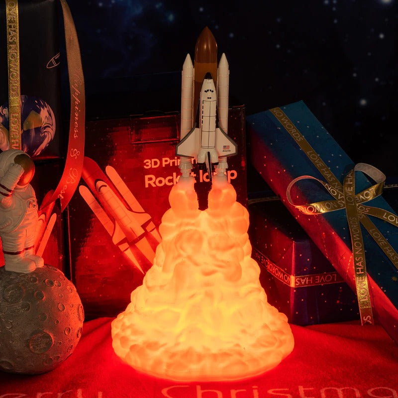 A rocket ship night light. The rocket looks like it just took-off with smoke behind it which is alight.