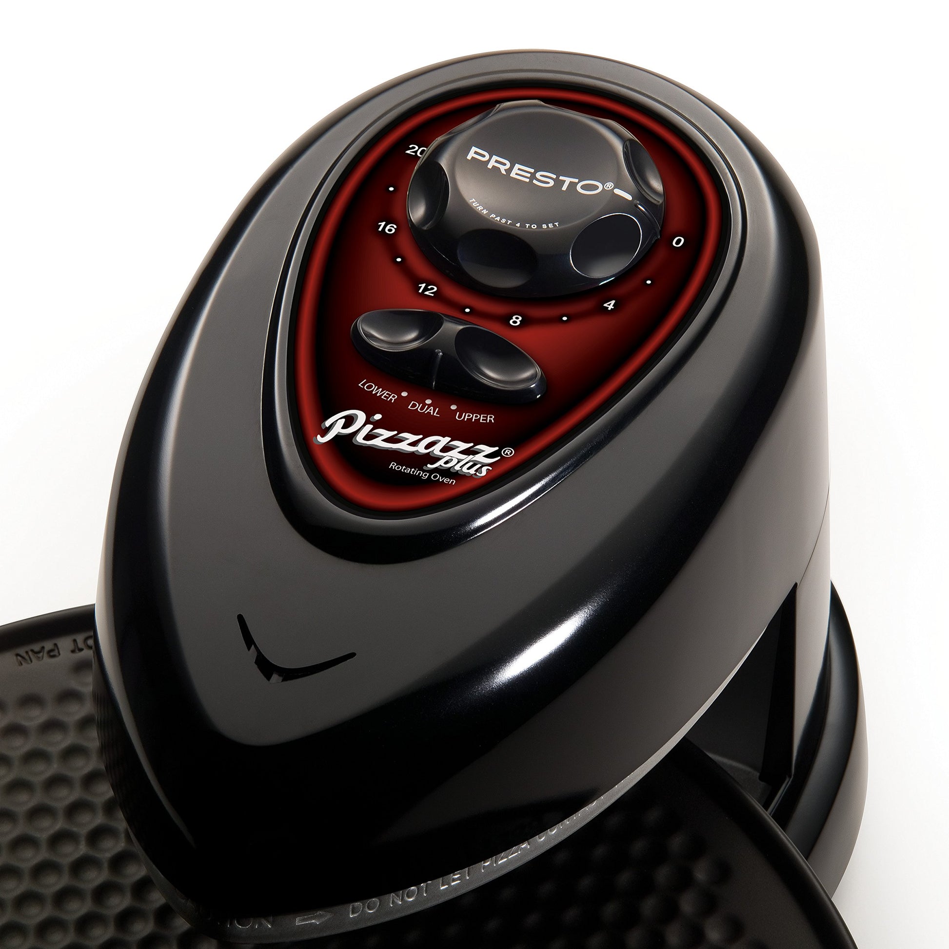 Close up view of the operating dials on a rotating pizza oven.