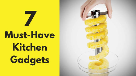 A hand using a pineapple corer and sliver featured in a gift guide for must-have kitchen gadgets