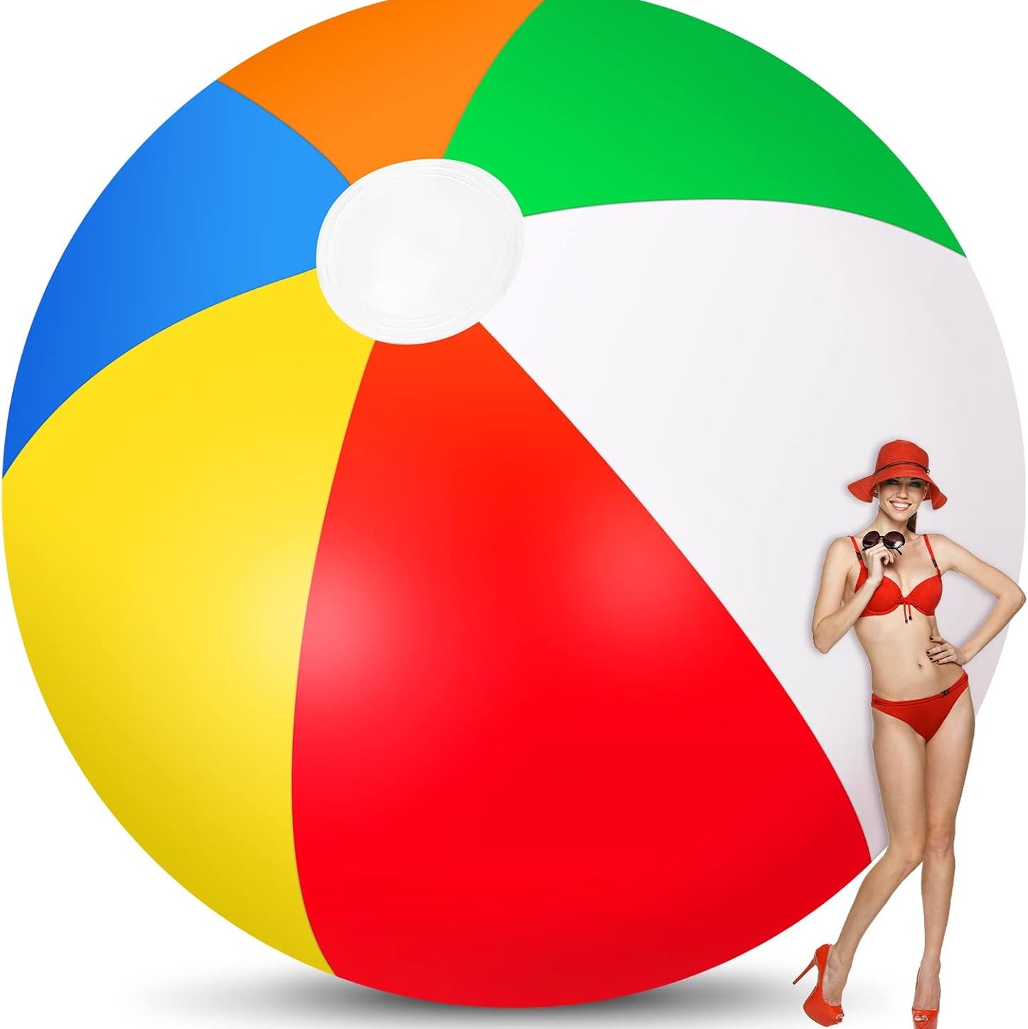 Woman in a red bikini and sun hat standing next to a large colorful beach ball on a white background