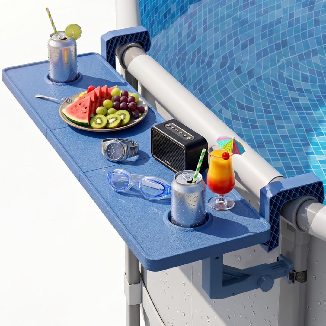 Blue poolside table with drinks, fruit, and a radio against a pool background