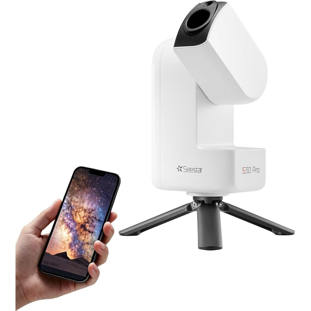 App-controlled smart telescope on tripod with smartphone displaying a detailed Milky Way image