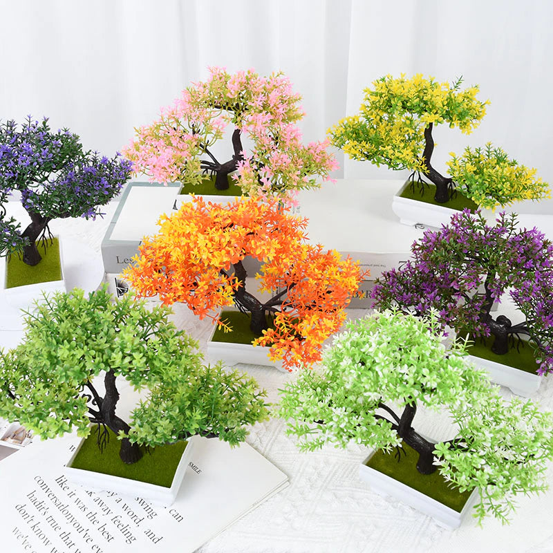 A variety of different colored artificial Bonsai trees.