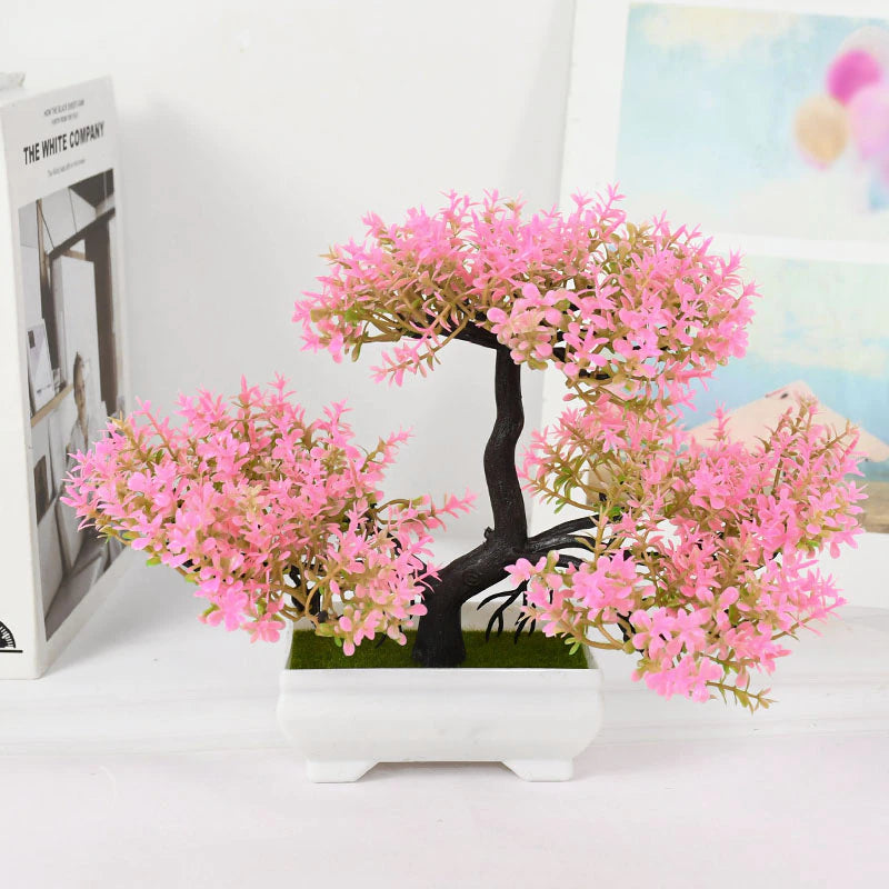 A lovely blush pink artificial Bonsai tree.
