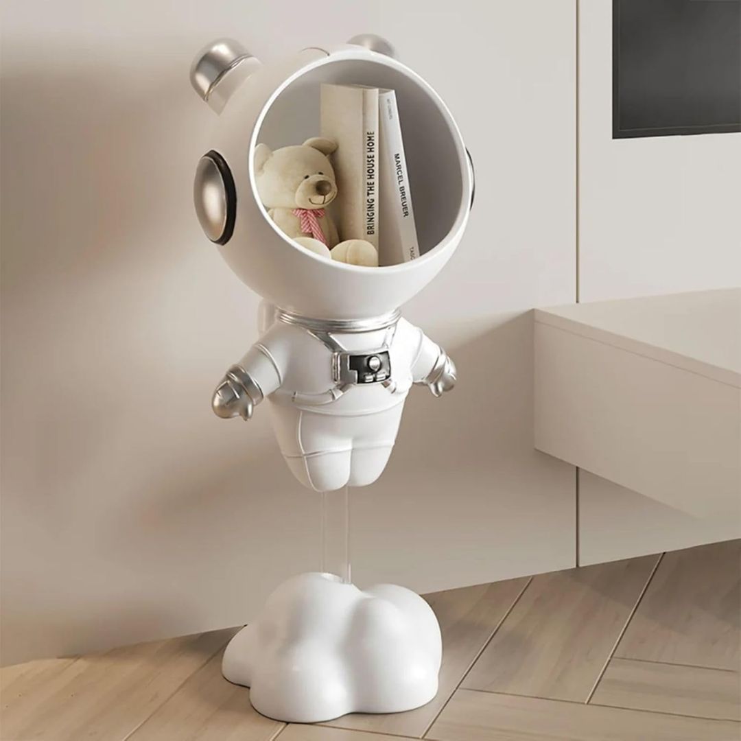 White astronaut side table with open helmet storage