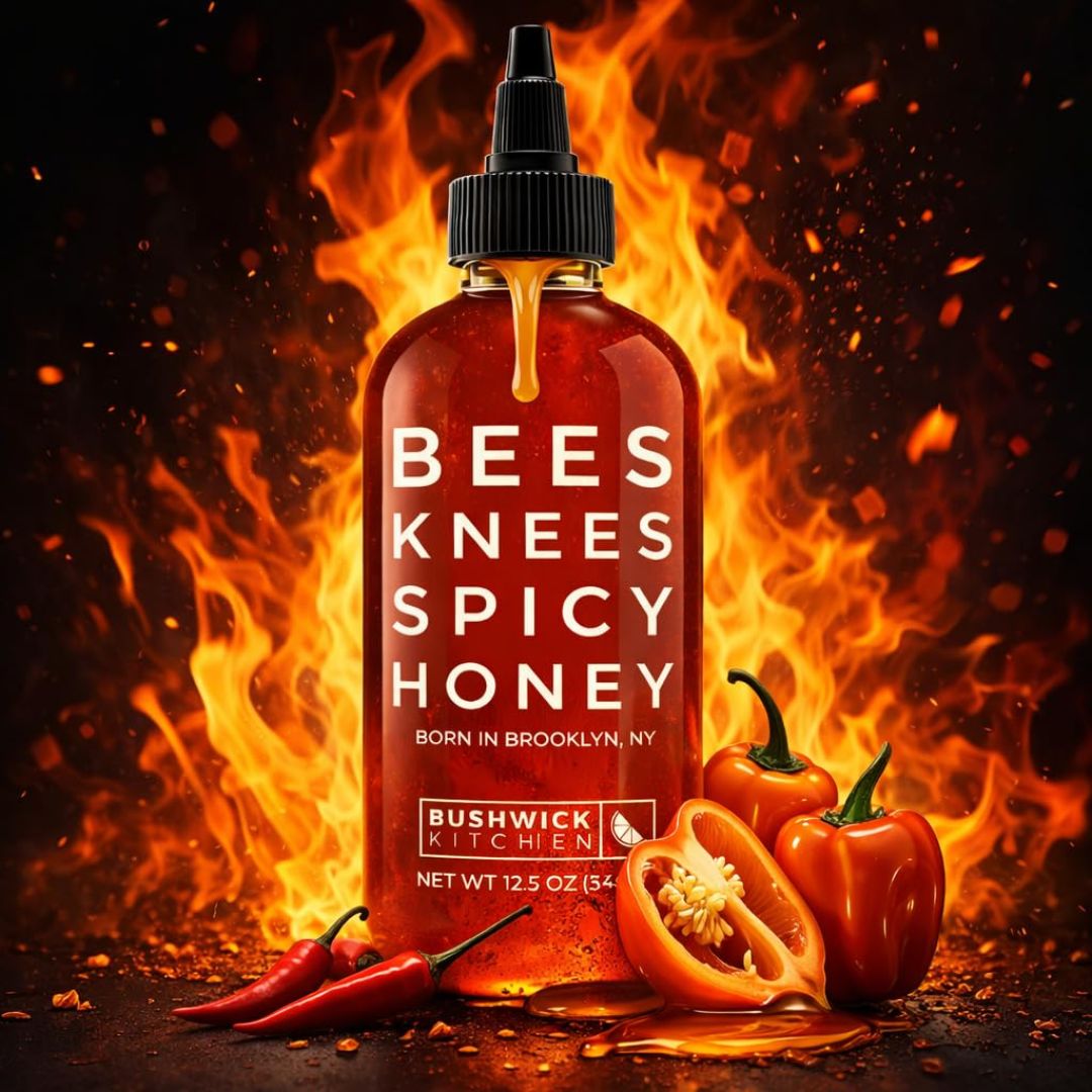 A bottle of Bees Knees spicy honey with flames in the background.
