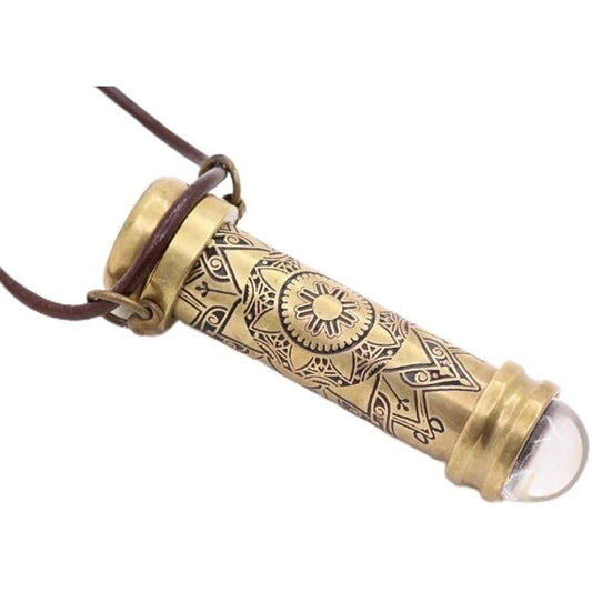 A brass teleidoscope necklace on a white background