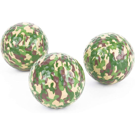 Three camouflage-patterned golf balls on a white background
