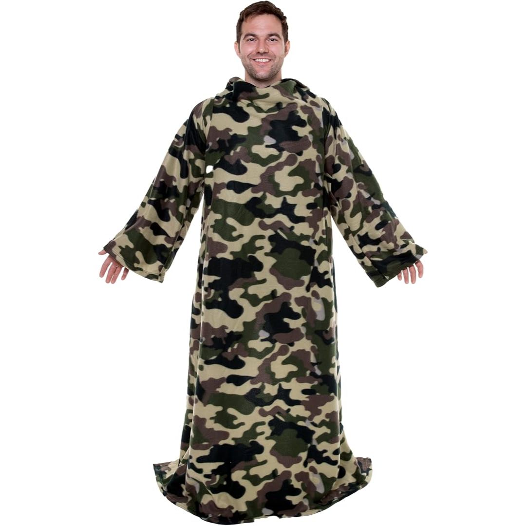A man wearing a long camouflage fleece wearable blanket with a hood and wide sleeves, shown against a plain white background.