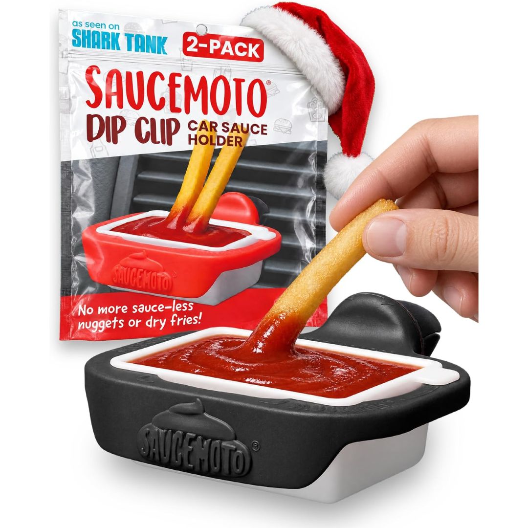 Car dipping sauce holder with vent clip, filled with ketchup and shown with retail packaging