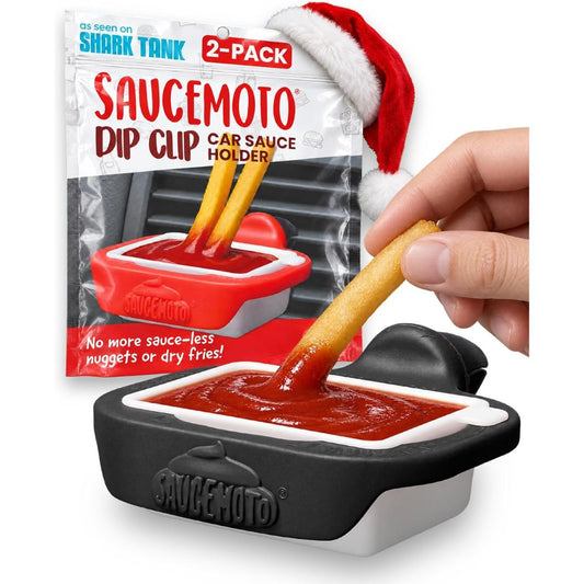 Car dipping sauce holder with vent clip, filled with ketchup and shown with retail packaging