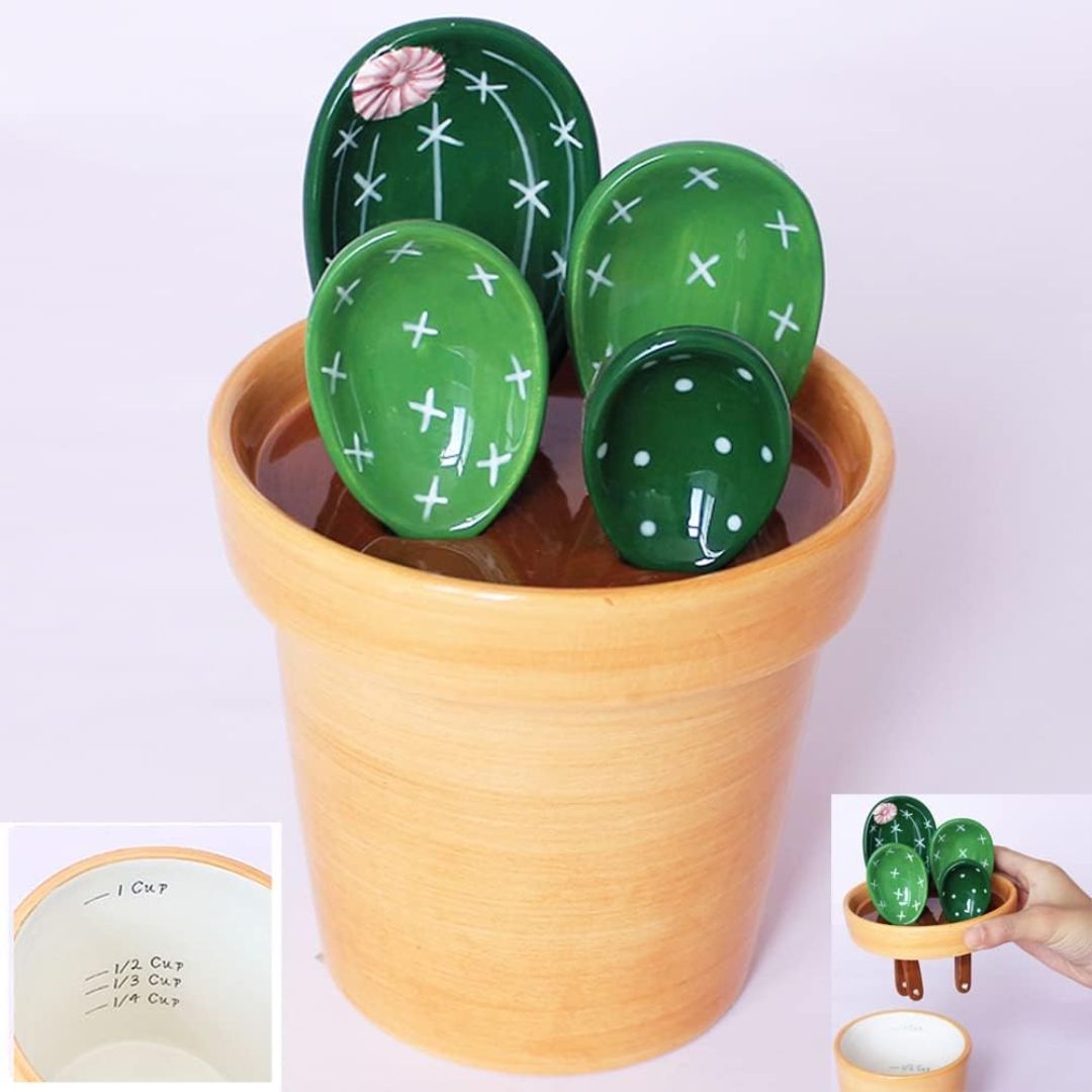 Ceramic cactus-shaped kitchen measuring spoons in a terracotta pot on a grey background