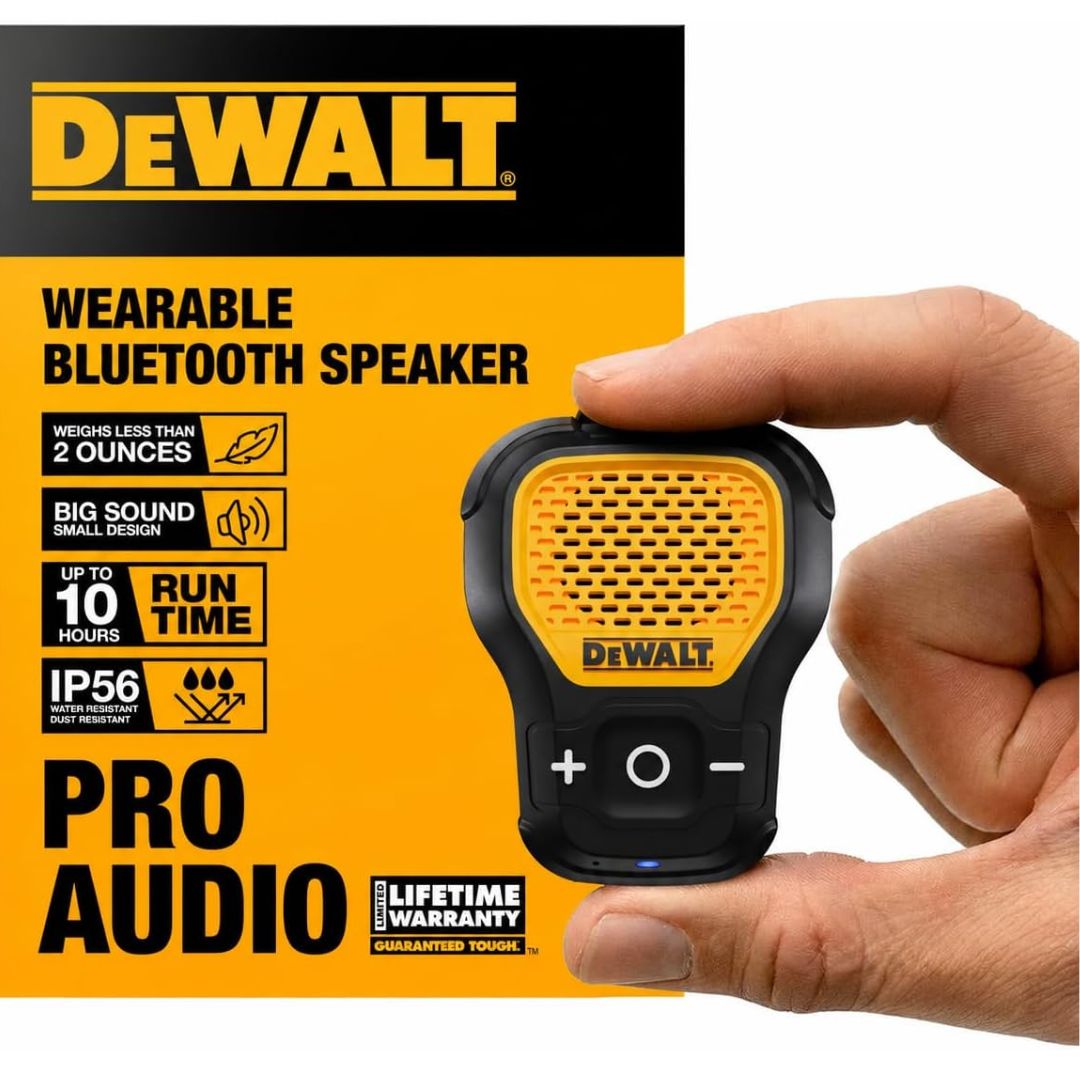 Compact clip on Bluetooth jobsite speaker held between two fingers