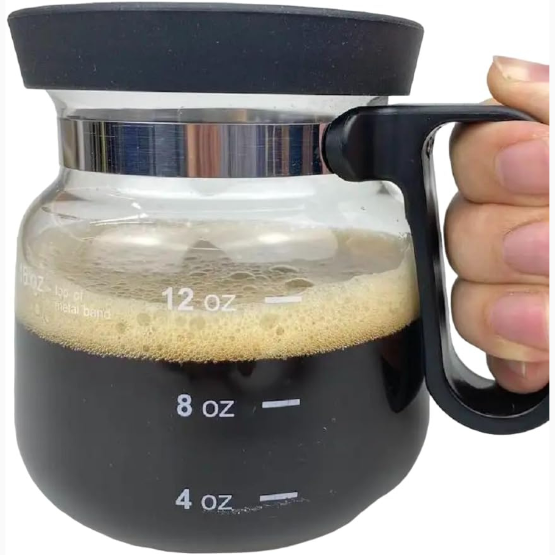 Mini coffee pot shaped travel mug with black lid and handle