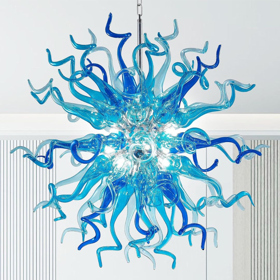 A colorful blue hand blown glass chandelier hanging from a ceiling