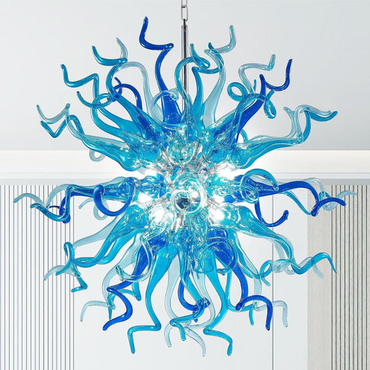 A colorful blue hand blown glass chandelier hanging from a ceiling