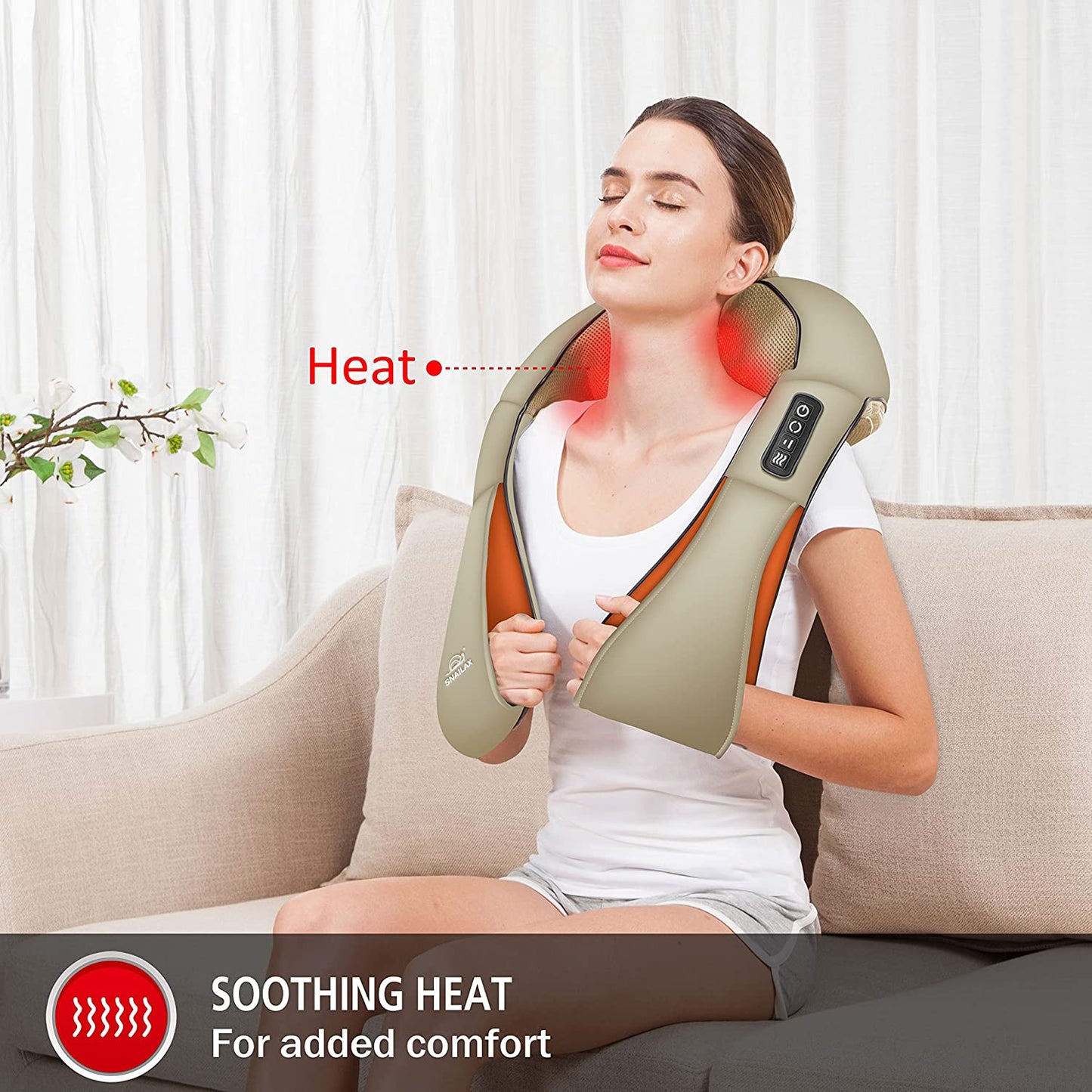 A woman is sitting on a lounge with a cordless neck massager around her shoulders.