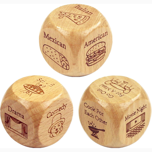 Three wooden couples date night dice with engraved phrases and symbols on a white background