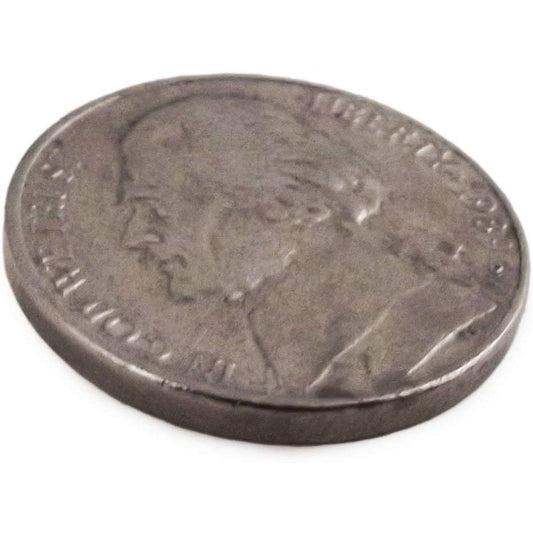 A regular looking US nickel.