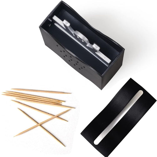 Black and silver square toothpick dispenser with toothpicks on a white background