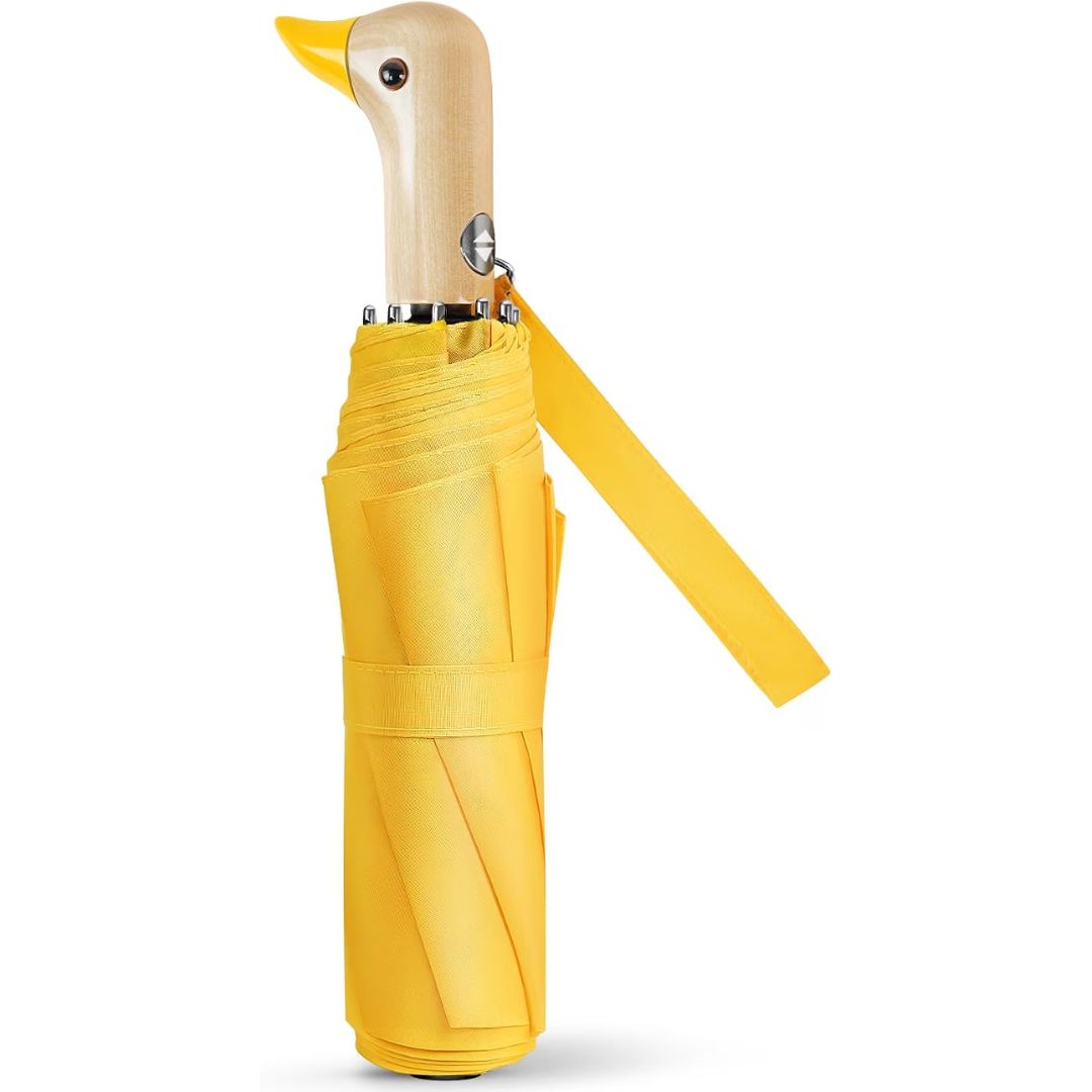 A folded yellow umbrella with a duck-shaped wooden handle and a matching yellow wrist strap, shown on a plain white background.