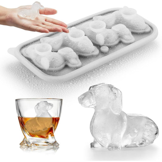 A silicone mold shown with a hand holding a dachshund-shaped ice cube, alongside a clear dachshund-shaped ice cube and a whiskey glass filled with amber liquid and a dog-shaped ice cube on a white background.